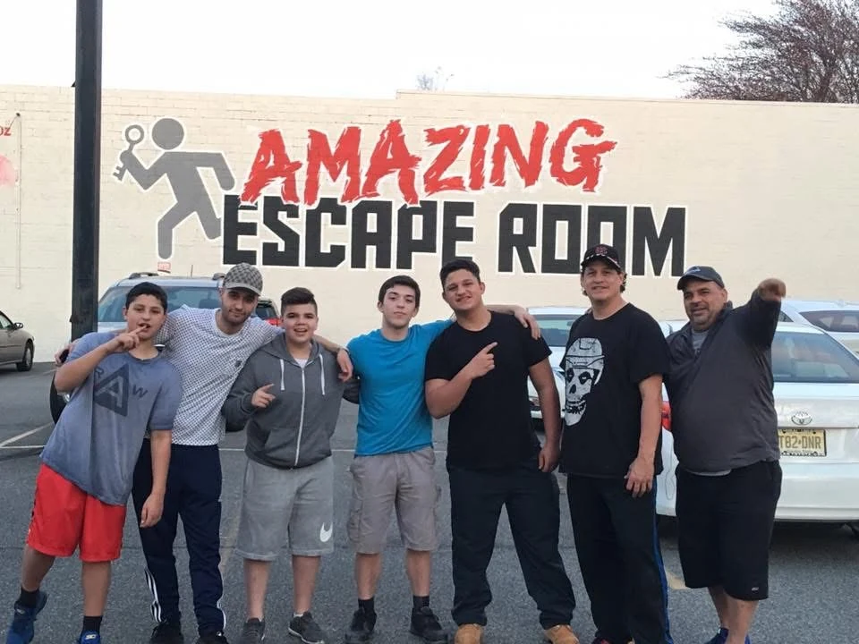 A group outside an Amazing Escape Room location